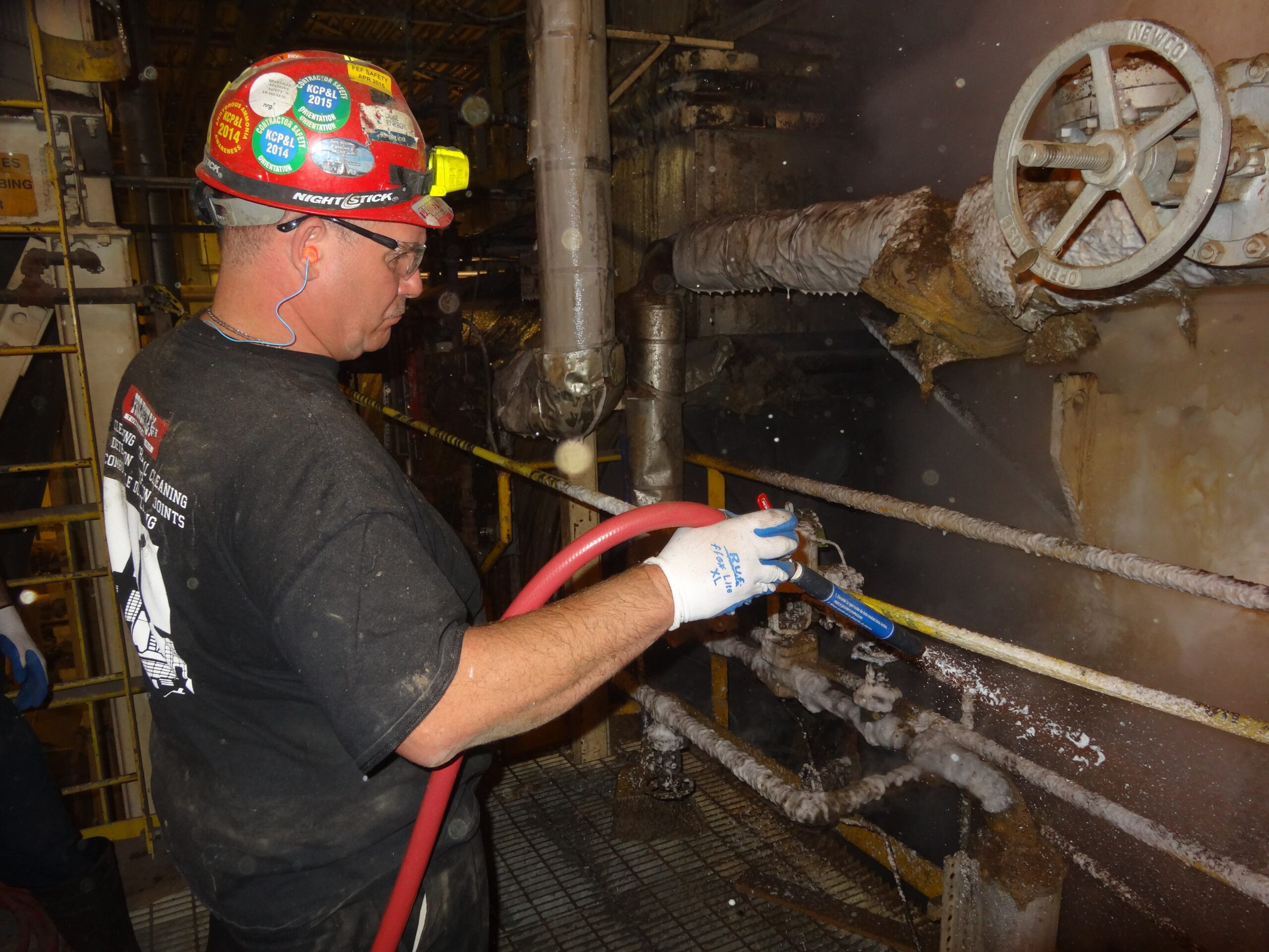 Combustible Dust Cleaning 1 Industrial Maintenance Worker performing Combustible Dust Cleaning Services