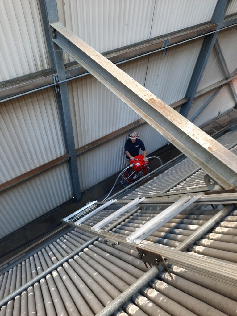 Air Cooled Condenser Cleaning 2 Air cooled condenser being cleaned as part of Projectile’s Air Cooled Condenser Cleaning Services