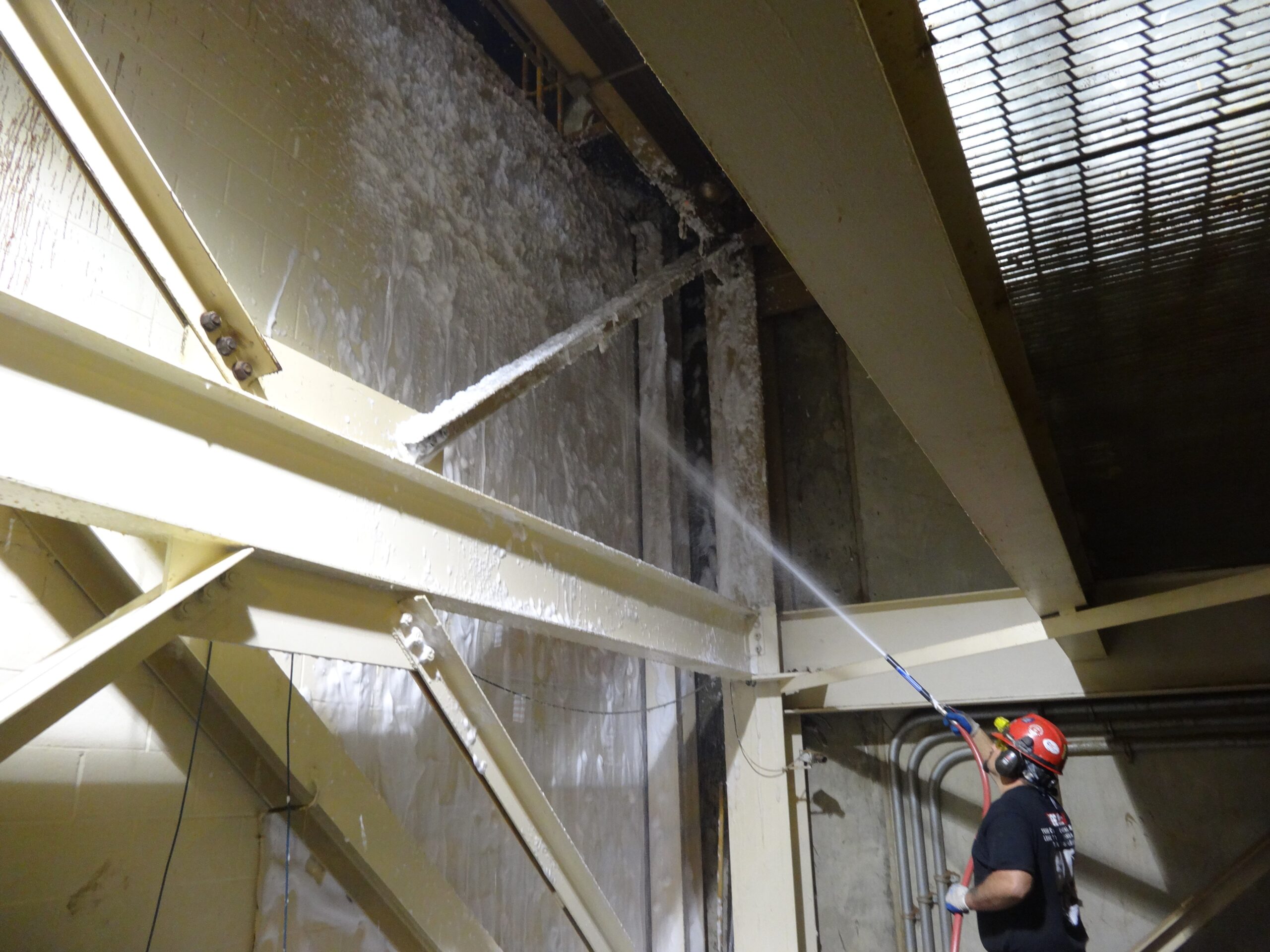 Combustible Dust Cleaning 2 Industrial Cleaning Working Cleaning Walls With Dust Encapsulating Foam